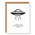 UFO “Thank You For Believing In Me” Card showing a minimal UFO beaming light with thank-you wording with front cover text: Thank you for believing in me