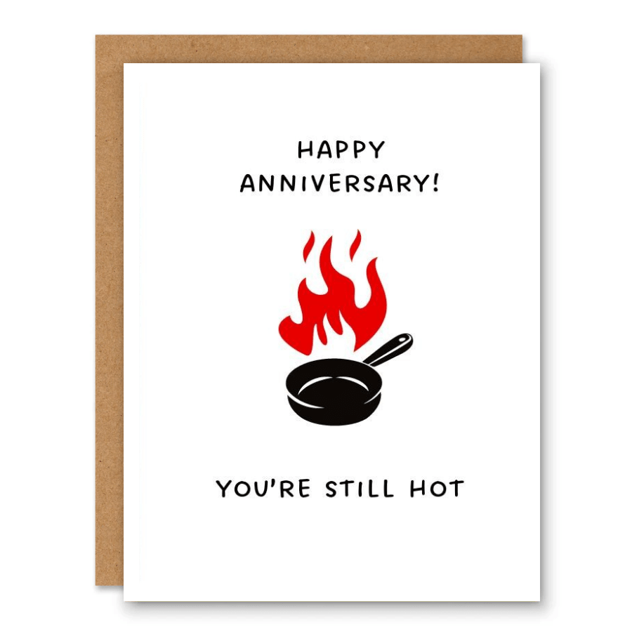 You’re Still Hot Anniversary Card showing a frying pan with flames above it with front cover text: Happy Anniversary! You’re still hot