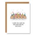 Egg-stra Special Birthday Card showing a carton of eggs in party hats with confetti with front cover text: I hope you have an egg-stra special birthday!