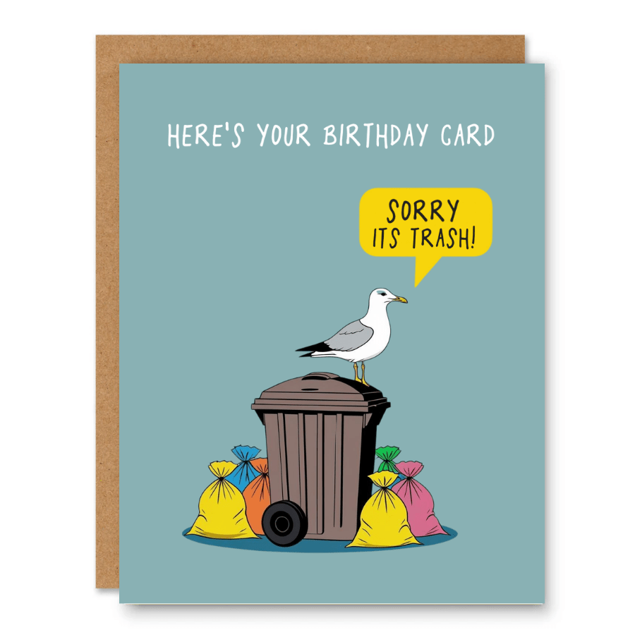Sorry It’s Trash Birthday Card showing a seagull on a trash can with garbage bags and birthday humour with front cover text: Here’s your birthday card. Sorry it’s trash!