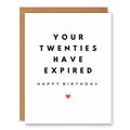 Your Twenties Have Expired Birthday Card showing minimal black typography with a small red heart with front cover text: Your twenties have expired. Happy birthday