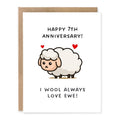 7th Anniversary Card Wool Pun Sheep Card showing a cute sheep with red hearts on a clean anniversary card with front cover text: Happy 7th anniversary! I wool always love ewe!