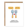 Funny 11th Anniversary Card – Steel Anniversary Card showing a cute spoon and fork with a red heart for the steel anniversary theme with front cover text: You’re steel the one! Now and fork-ever! Happy 11th anniversary!
