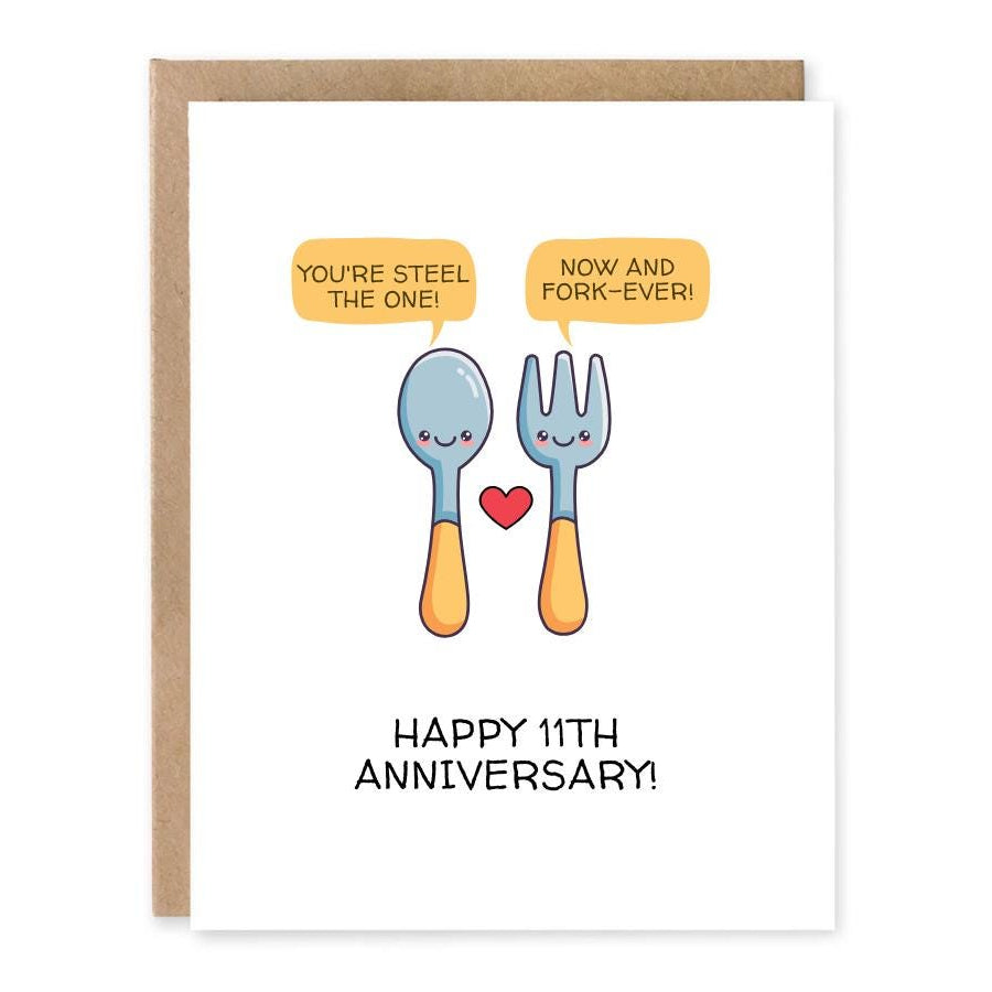 Funny 11th Anniversary Card – Steel Anniversary Card showing a cute spoon and fork with a red heart for the steel anniversary theme with front cover text: You’re steel the one! Now and fork-ever! Happy 11th anniversary!