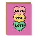 Love You Lots Card showing a colourful heart design with bold love-you lettering with front cover text: Love You Lots